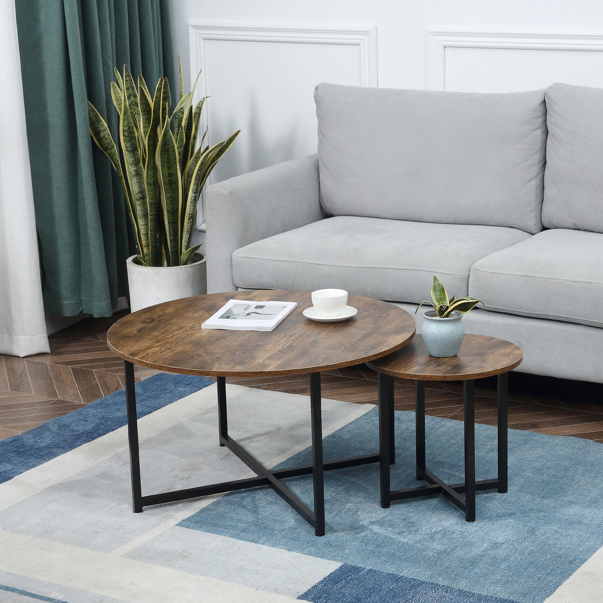 Round nesting coffee tables with rustic wood top and black metal legs living room set