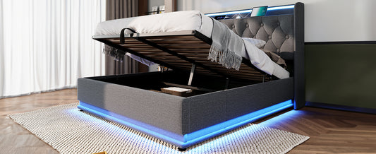 Grey fabric storage bed with diamond tufted headboard and blue LED base lighting