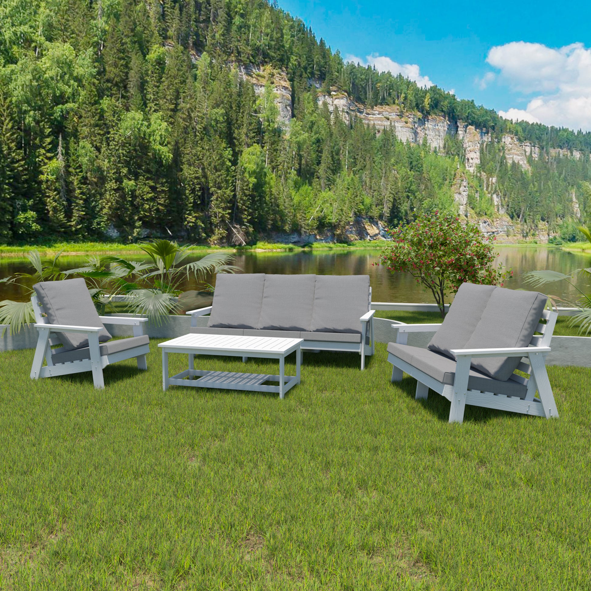 White modern outdoor sofa set with grey cushions on a grassy lawn