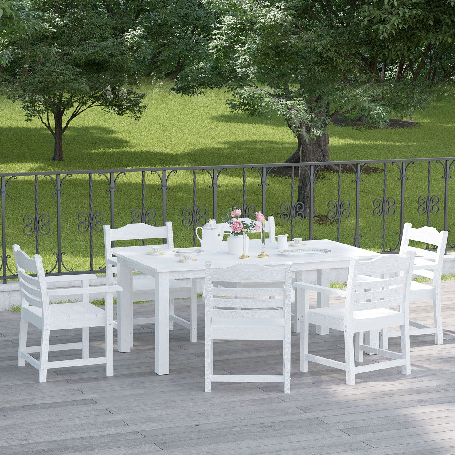 White wooden dining set with six chairs on a patio