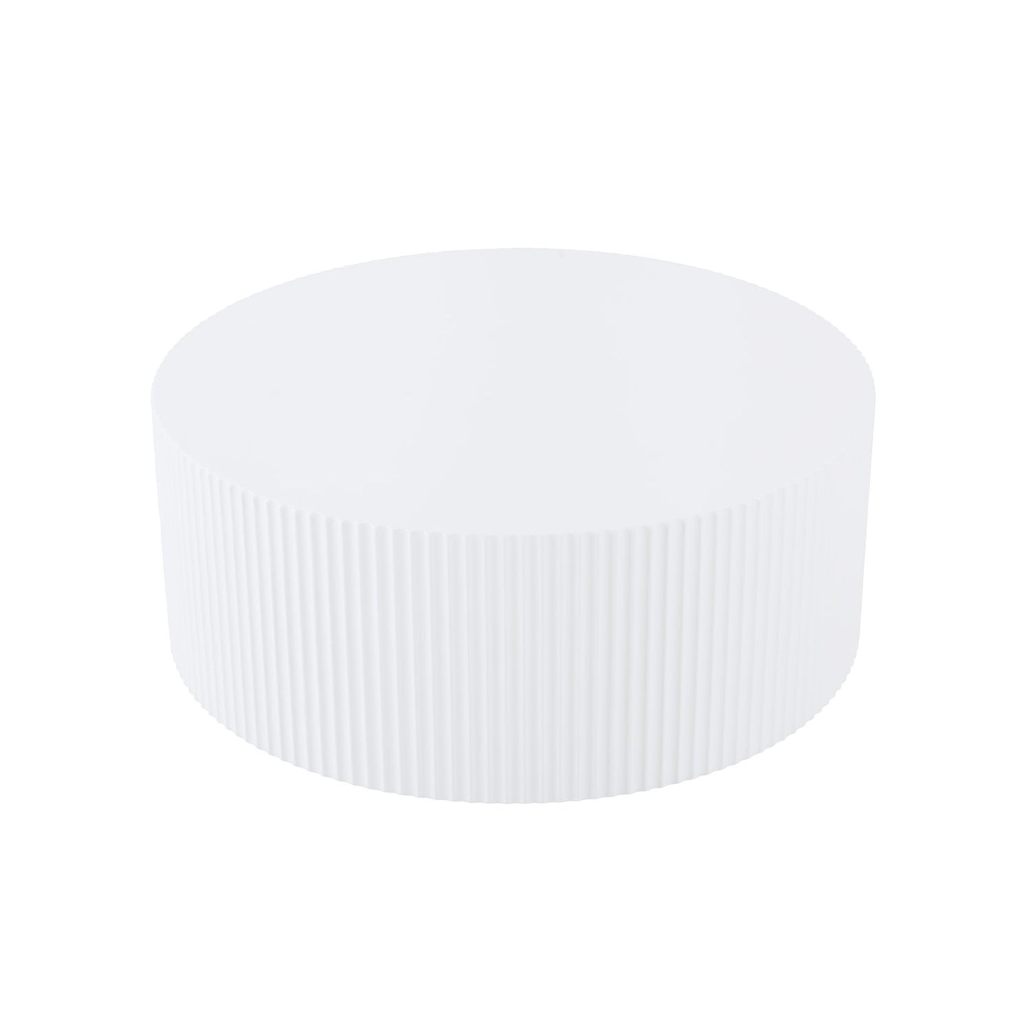 White fluted drum coffee table with a modern minimalist design