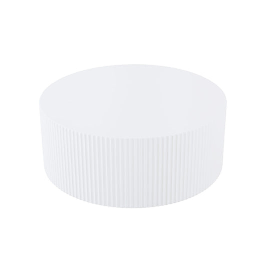White fluted drum coffee table with a modern minimalist design