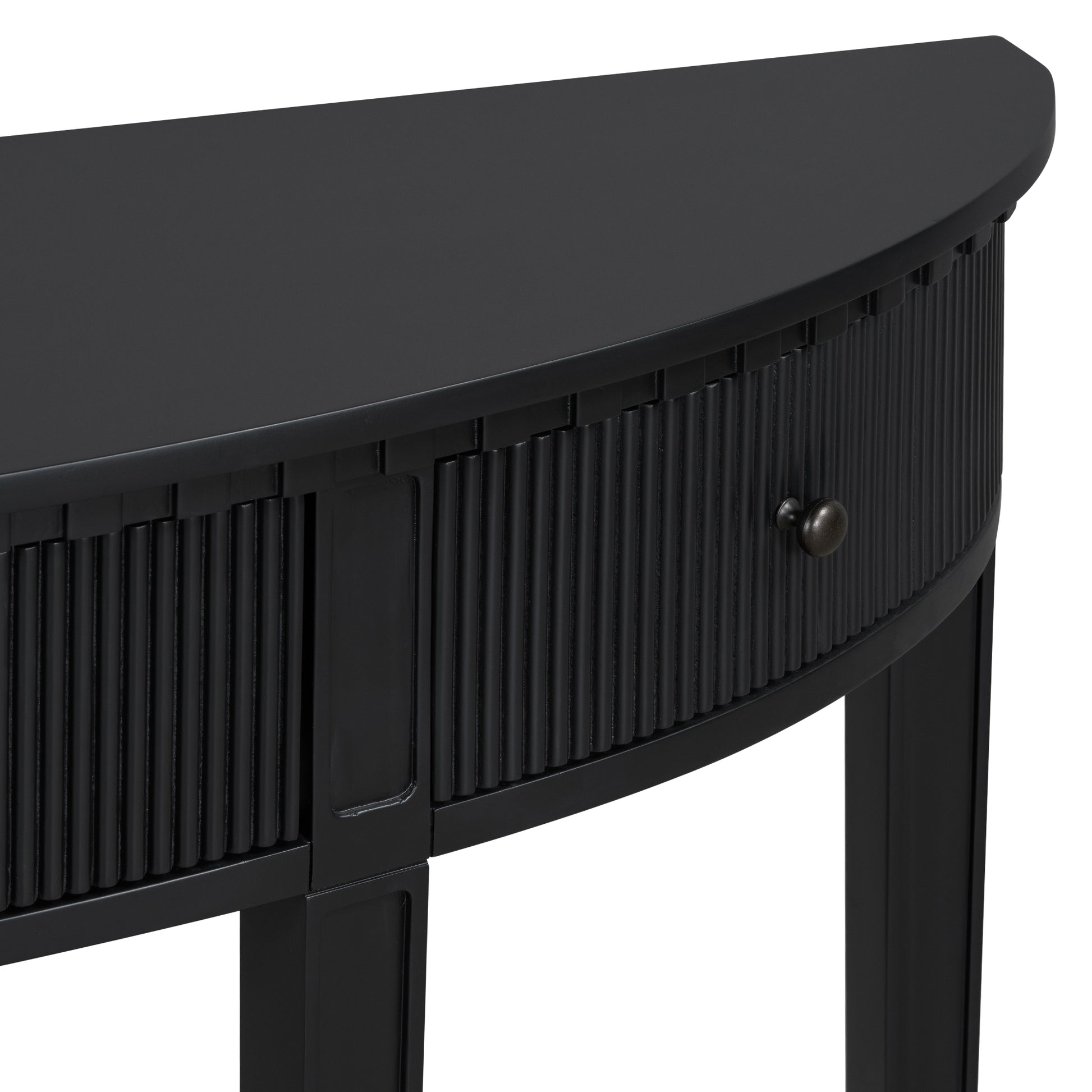 Black fluted drawer front detail on a modern console table with dark hardware