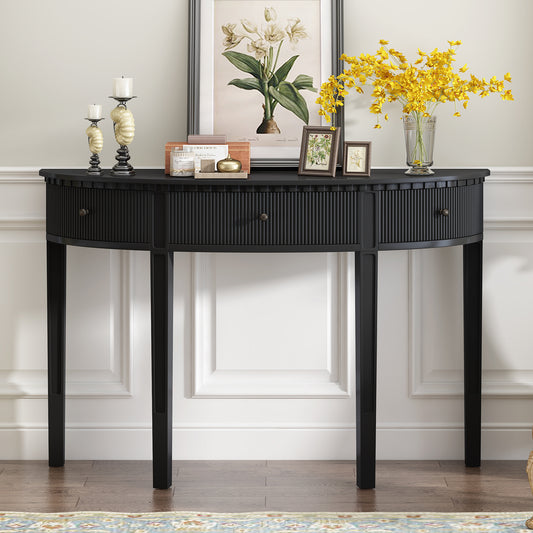 Black fluted console table with three drawers and antique brass knobs