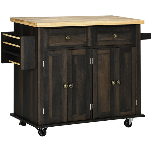 Dark wood kitchen island with butcher block top and brass hardware