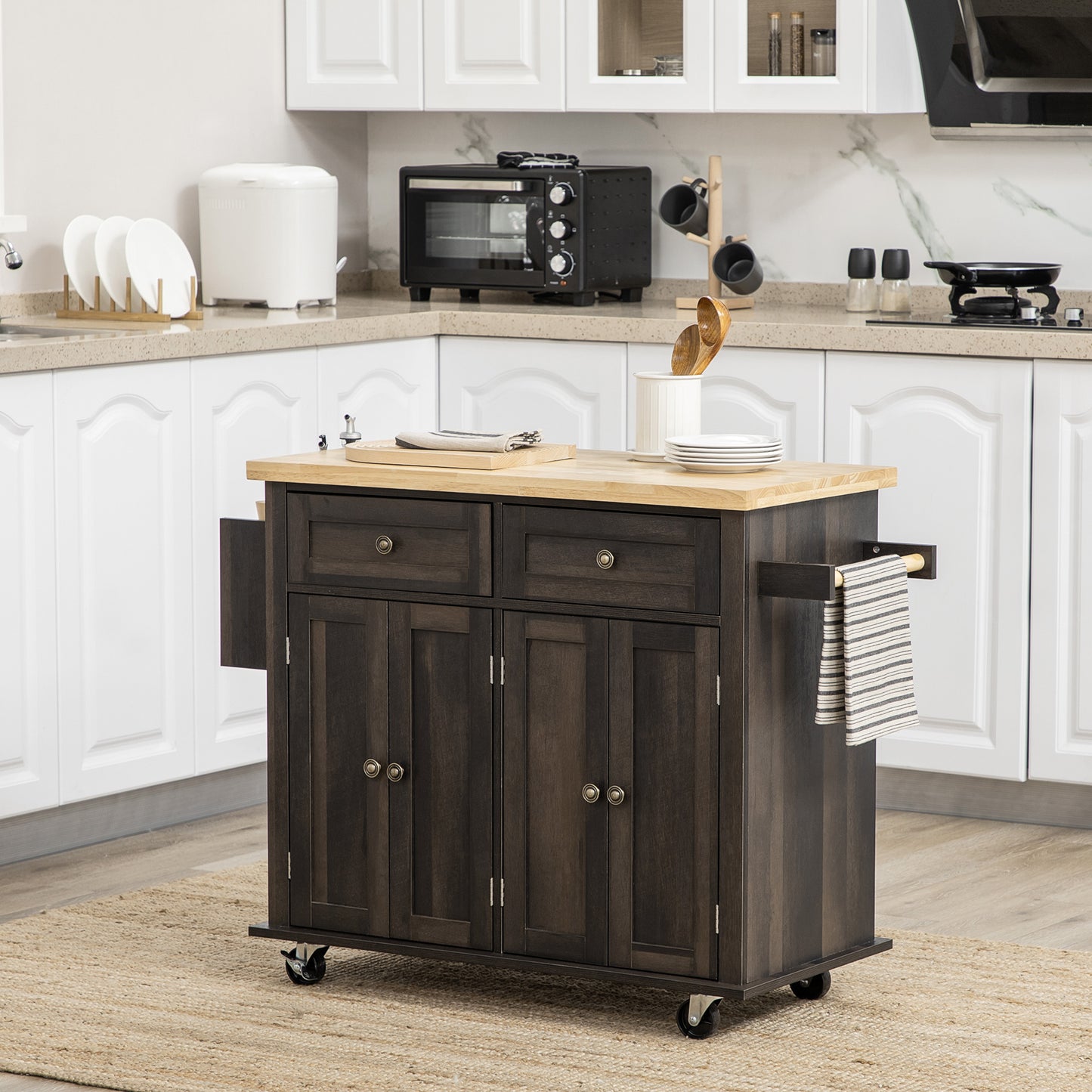 Dark wood kitchen island with butcher block top and casters