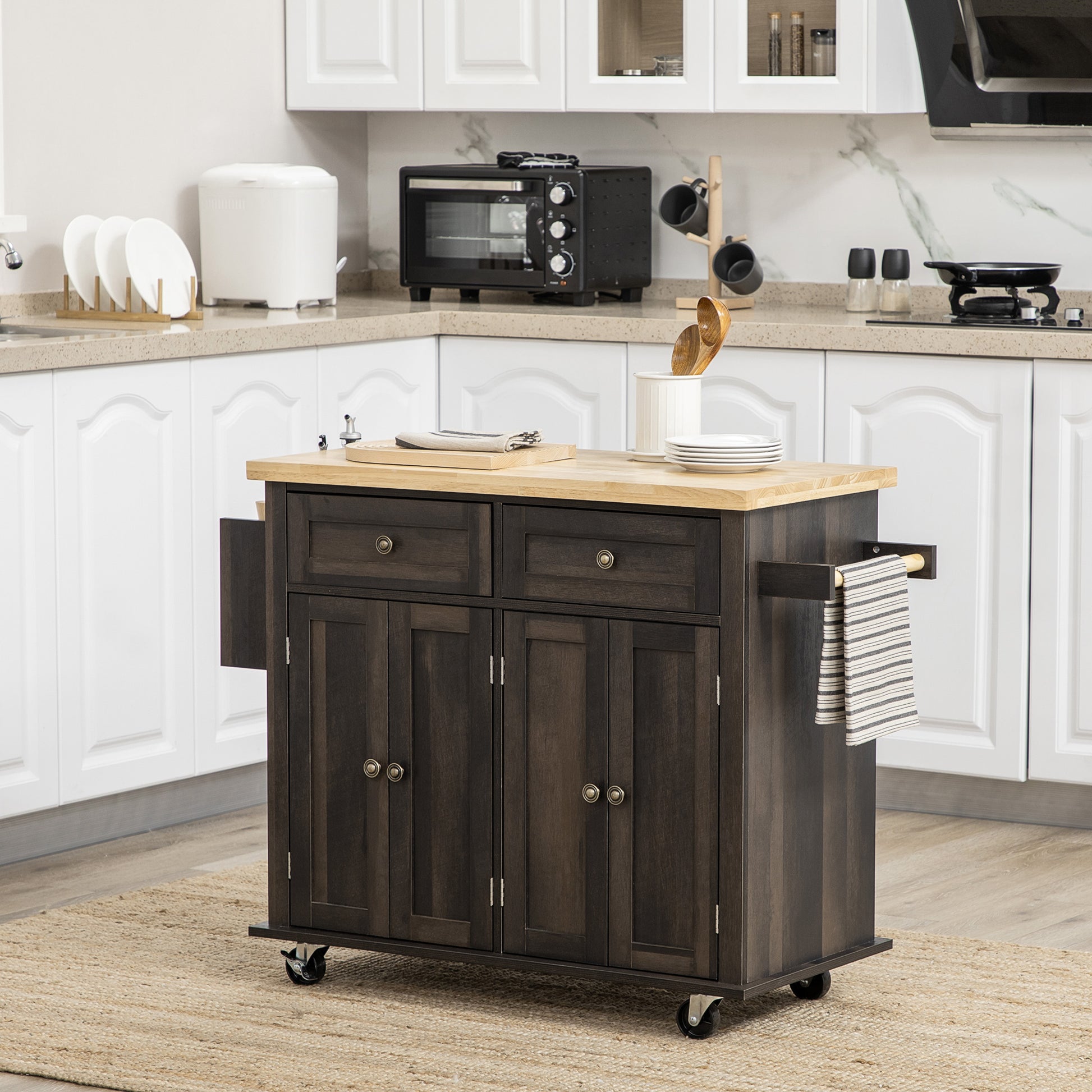 Dark wood kitchen island with butcher block top and casters