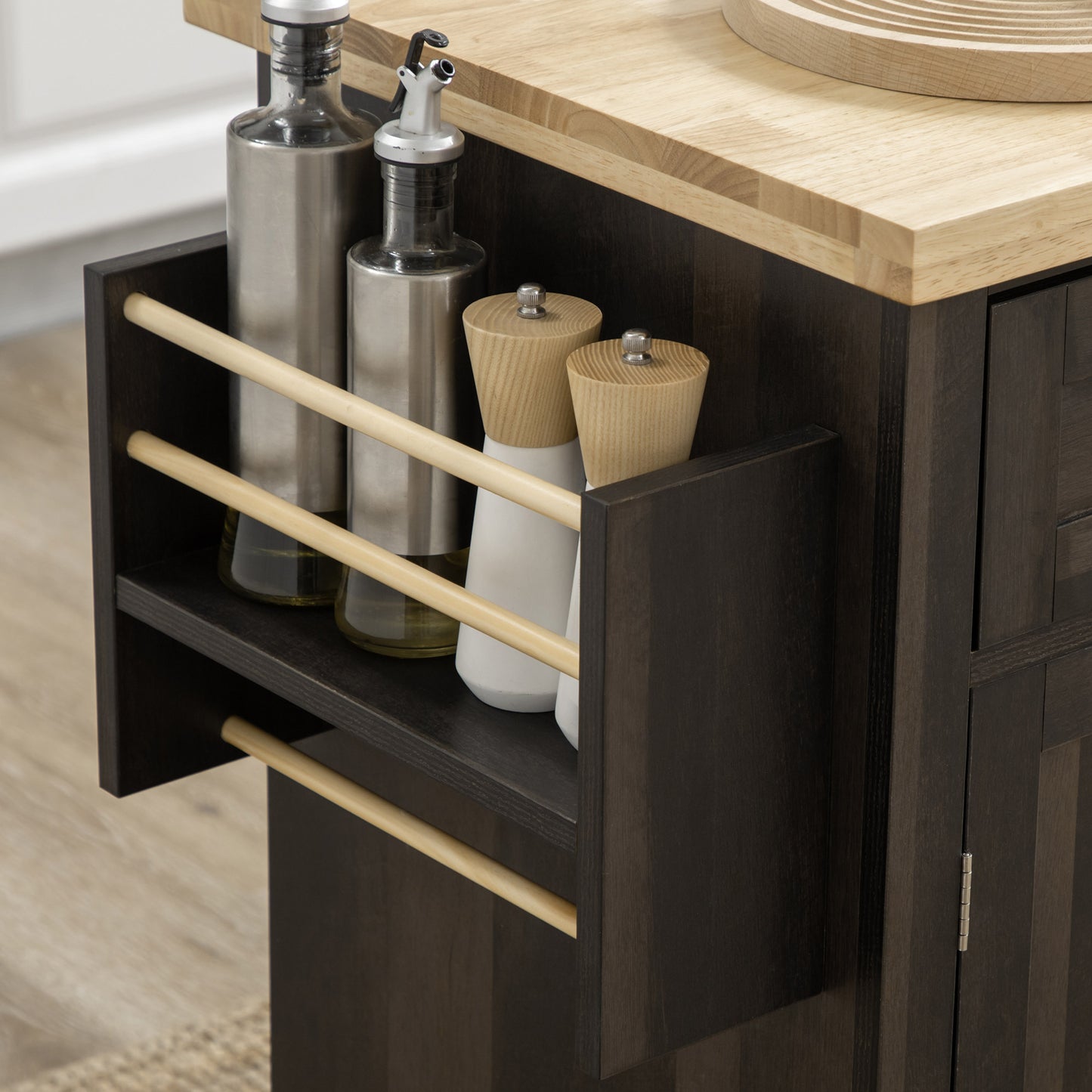 Dark wood kitchen cart with oil cruets and salt pepper grinders