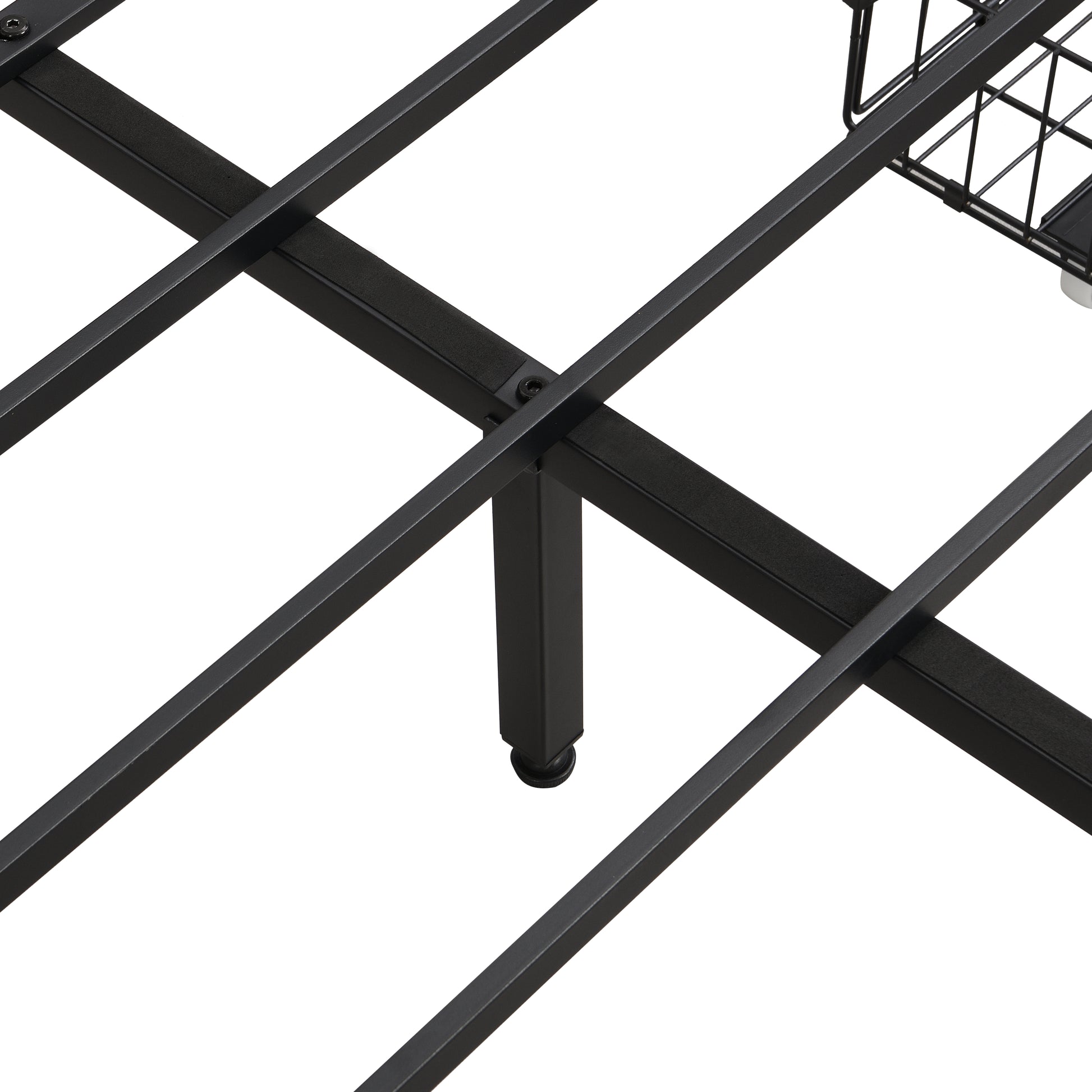 Closeup of a sturdy black metal bed frame with supporting crossbars and a single leg