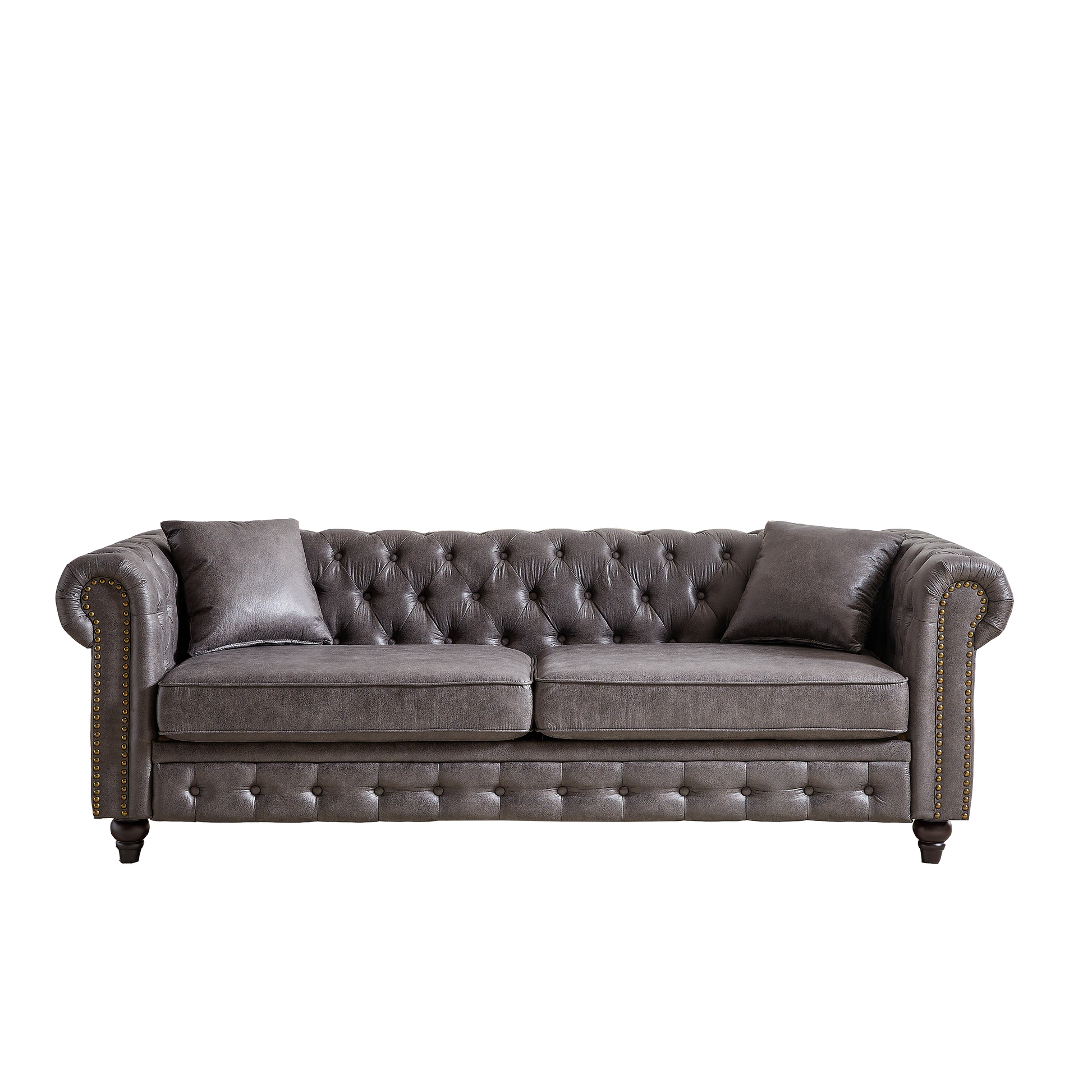 Dark gray leather Chesterfield sofa with button tufting and brass nailhead trim