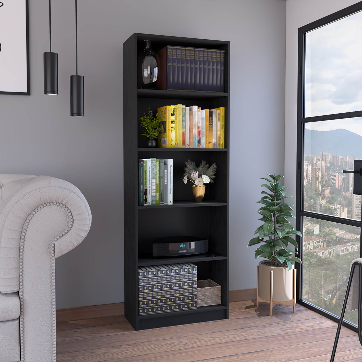 Tall black bookshelf with five shelves holding books and decorative items