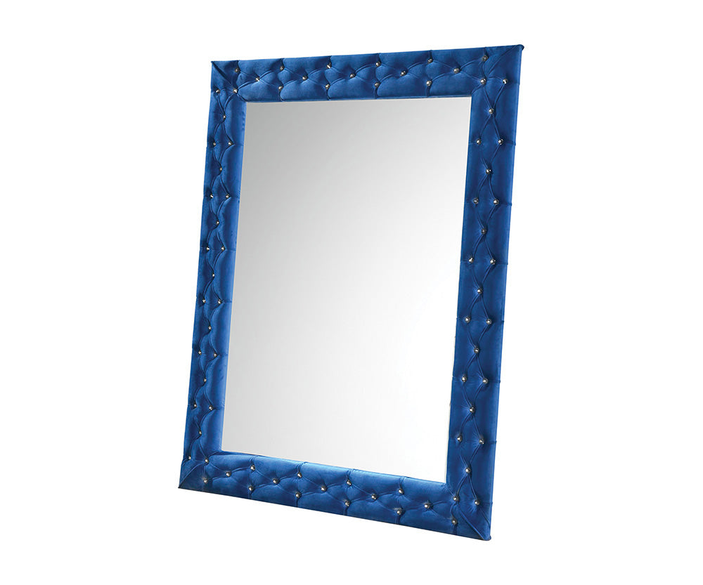 Luxurious blue velvet tufted mirror with crystal accents