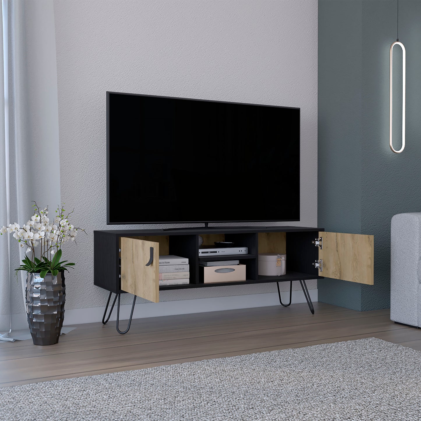 Black and oak TV stand with hairpin legs and open shelving