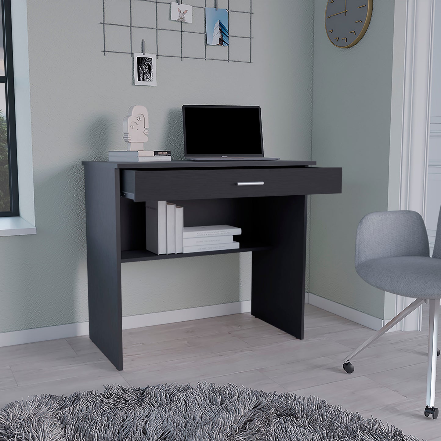 Compact dark gray writing desk with open shelf and drawer ideal for small spaces