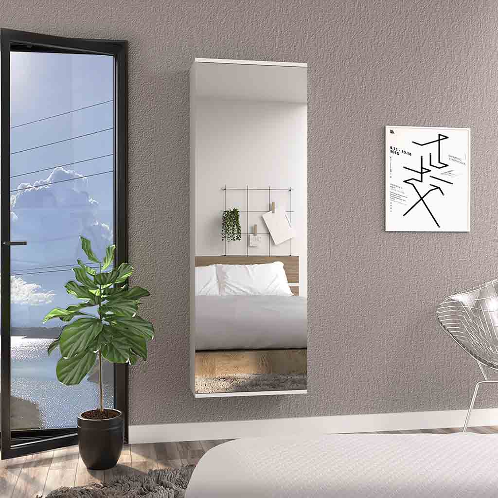 Fulllength modern wall mirror with minimalist white frame reflecting a bedroom scene