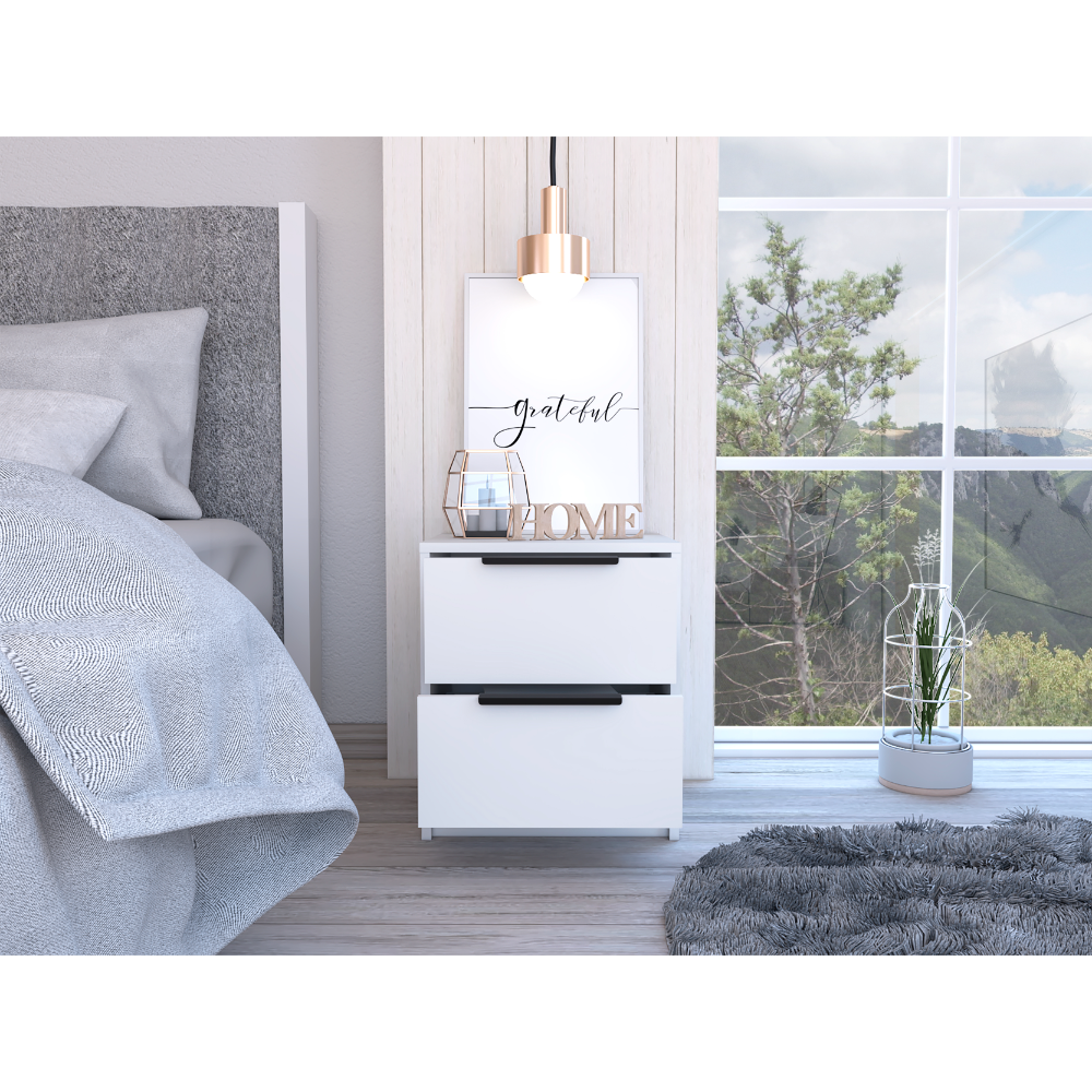 Minimalist white twodrawer nightstand with black handles and decor