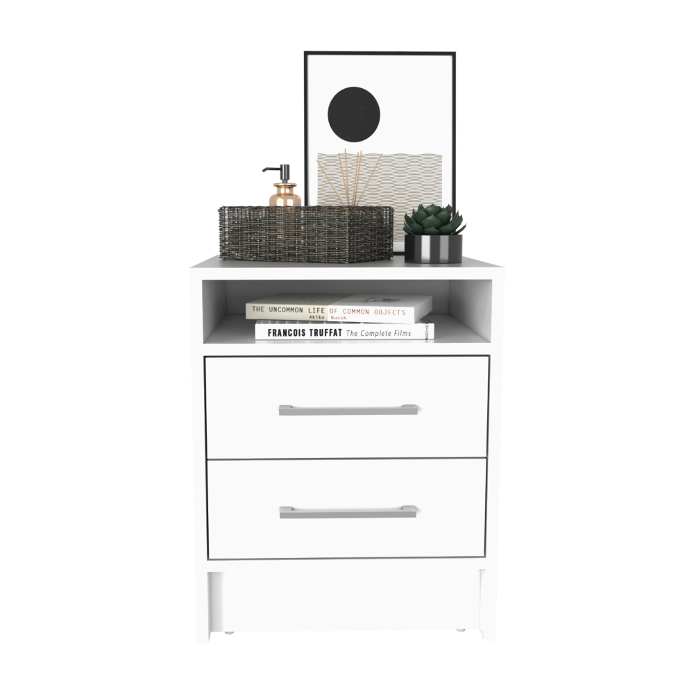 White modern nightstand with two drawers topped with decor for a bedroom