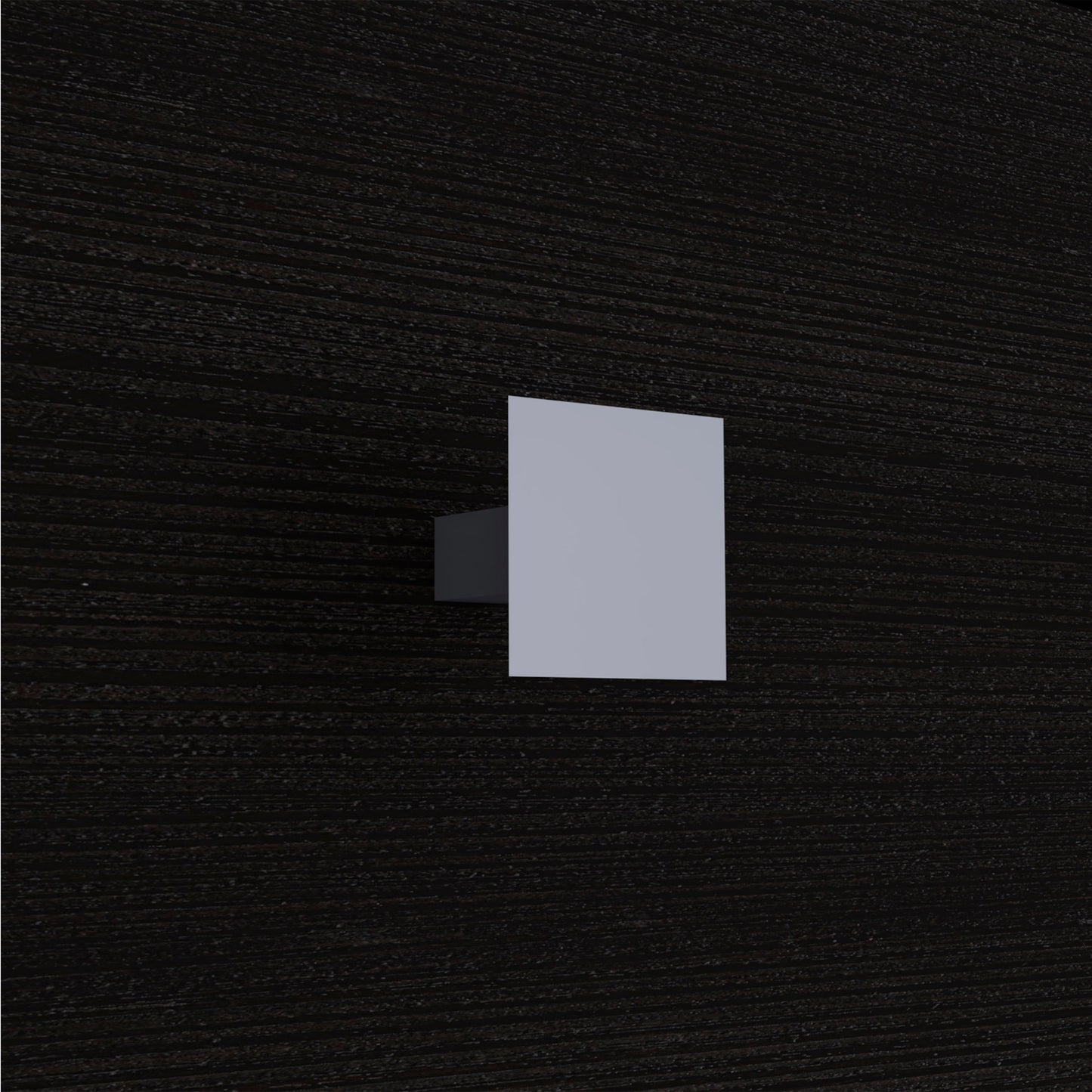 Matte black wooden textured drawer pull with a minimalist silver square front