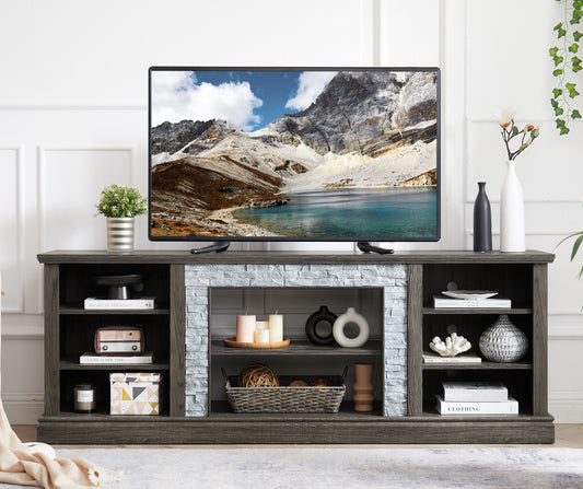 Dark gray wood TV stand with stone fireplace accent and open shelving for media consoles
