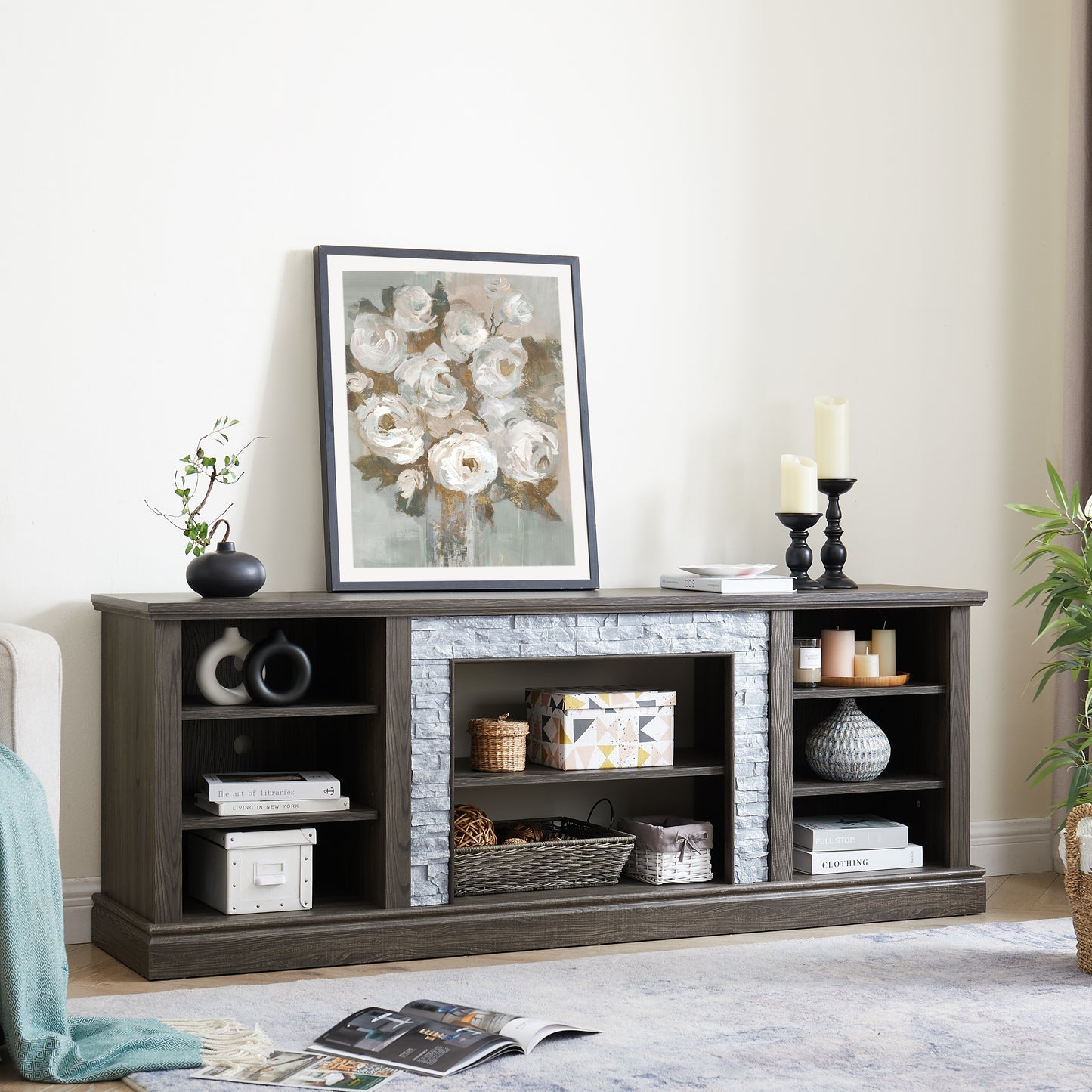 Dark oak media console with faux stone fireplace insert perfect for a modern living room
