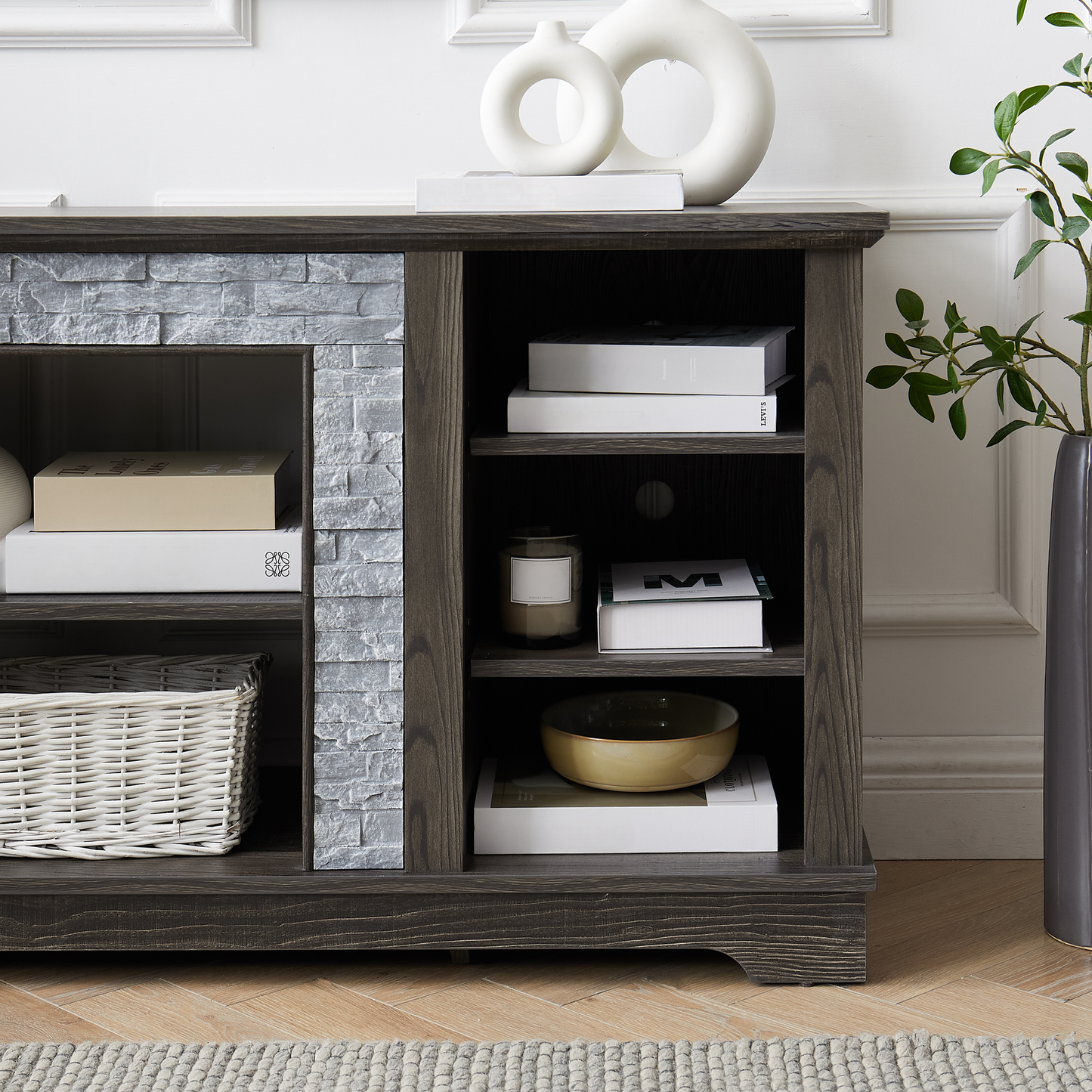 Dark wood media console with faux stone inlay and open shelving for storage