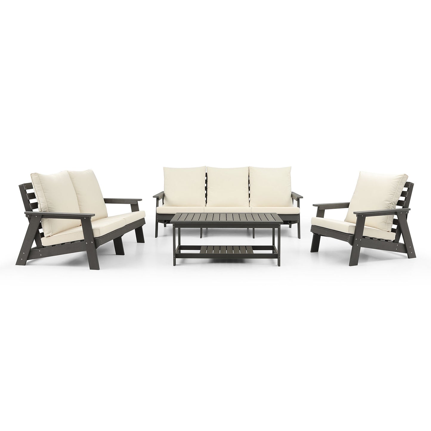 Dark gray polywood patio set with cream cushions featuring a threeseater sofa two chairs and a coffee table