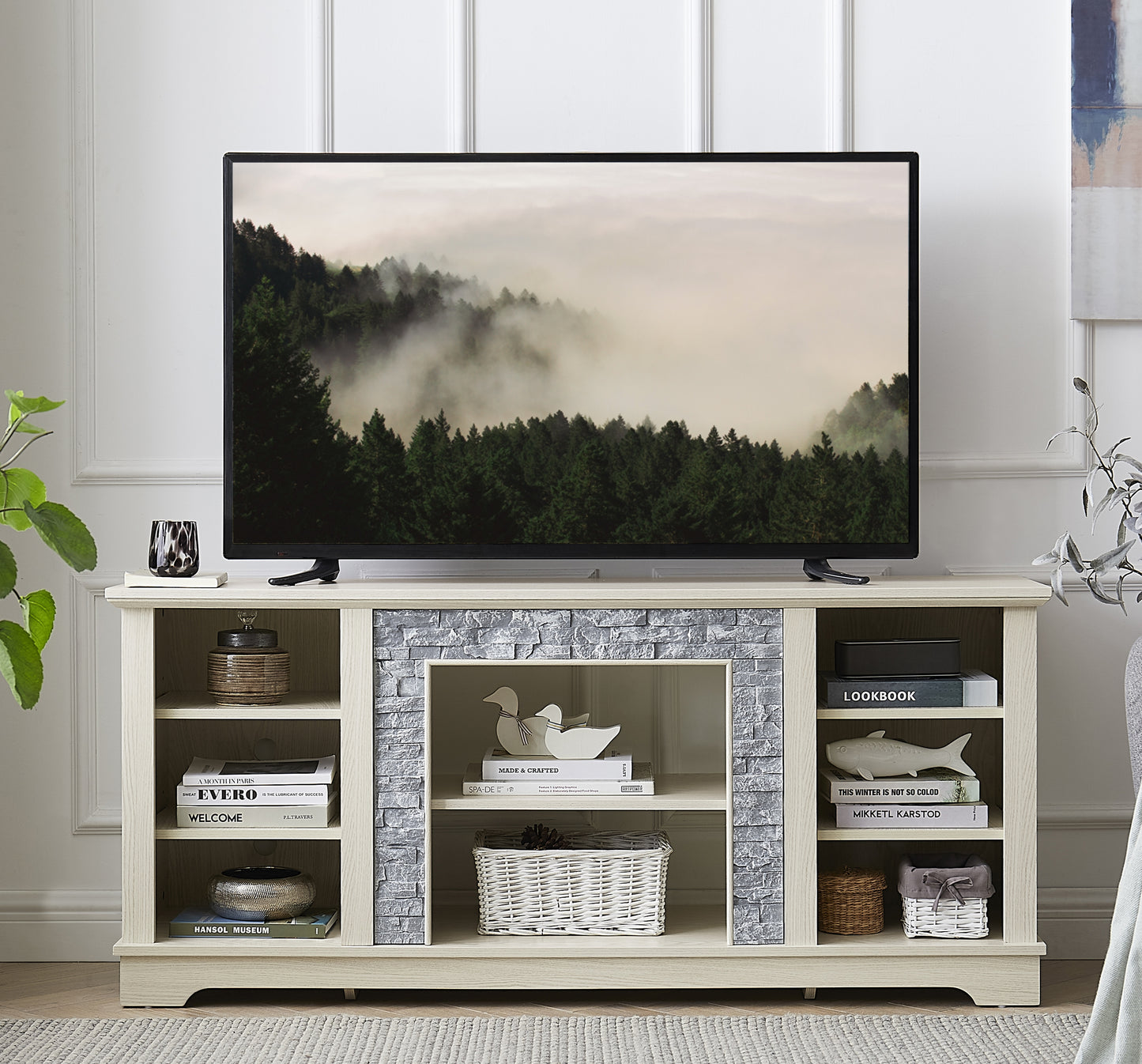 Light oak media console with faux stone accents and open shelving for storage