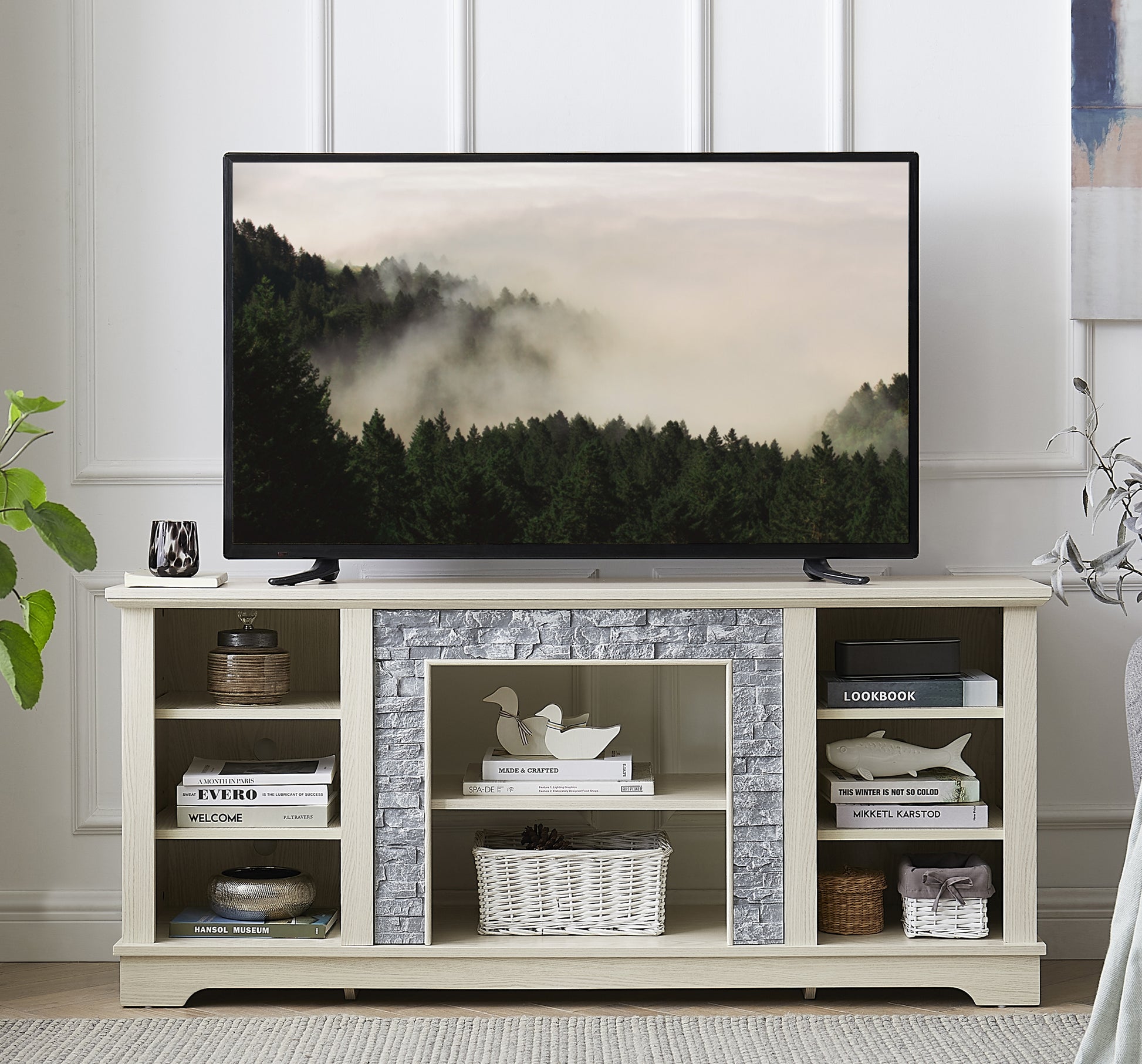 Light oak media console with faux stone accents and open shelving for storage