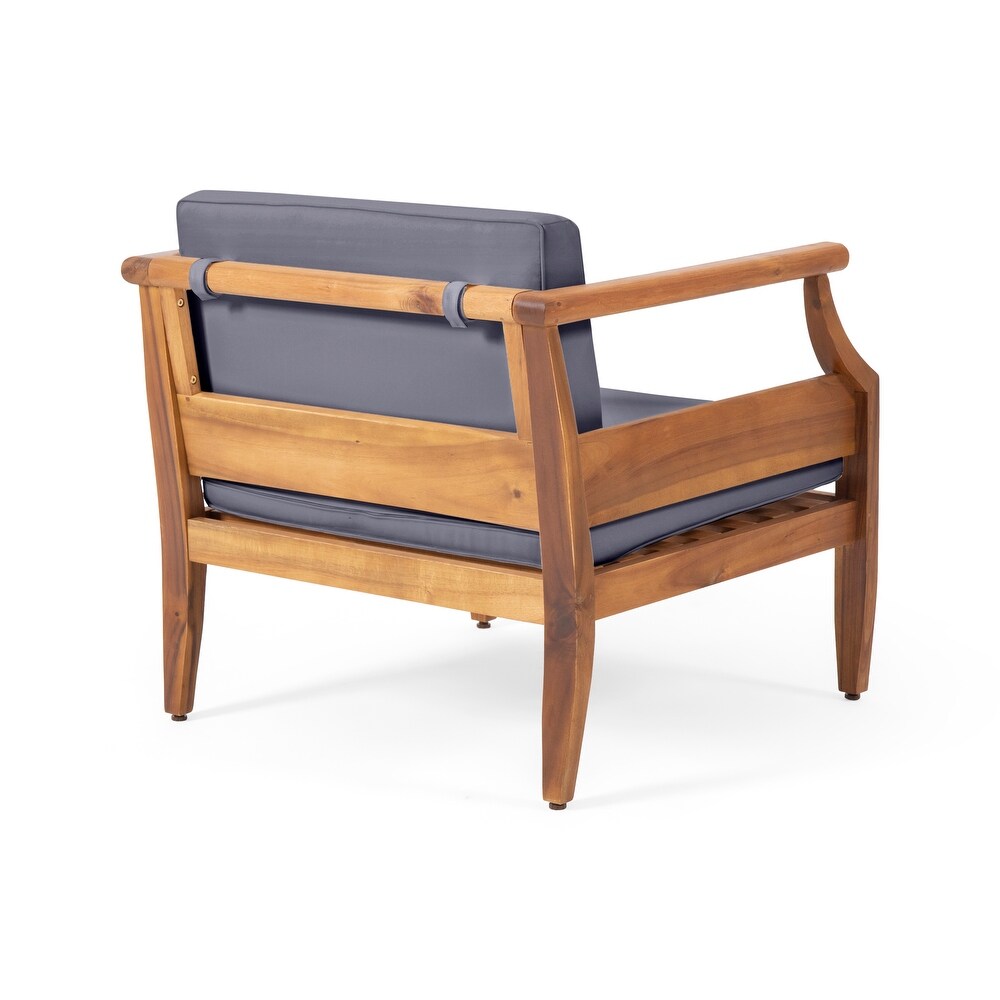 Wooden armchair with grey cushions showcasing midcentury modern design style
