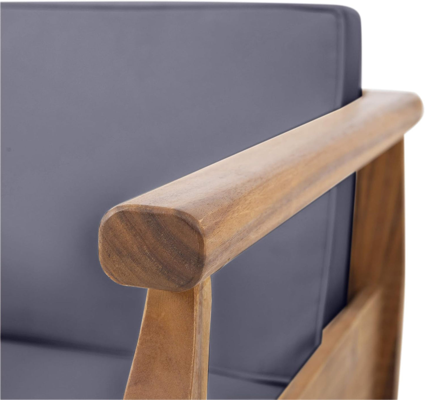 Closeup of rounded wooden armrest on a grey upholstered accent chair