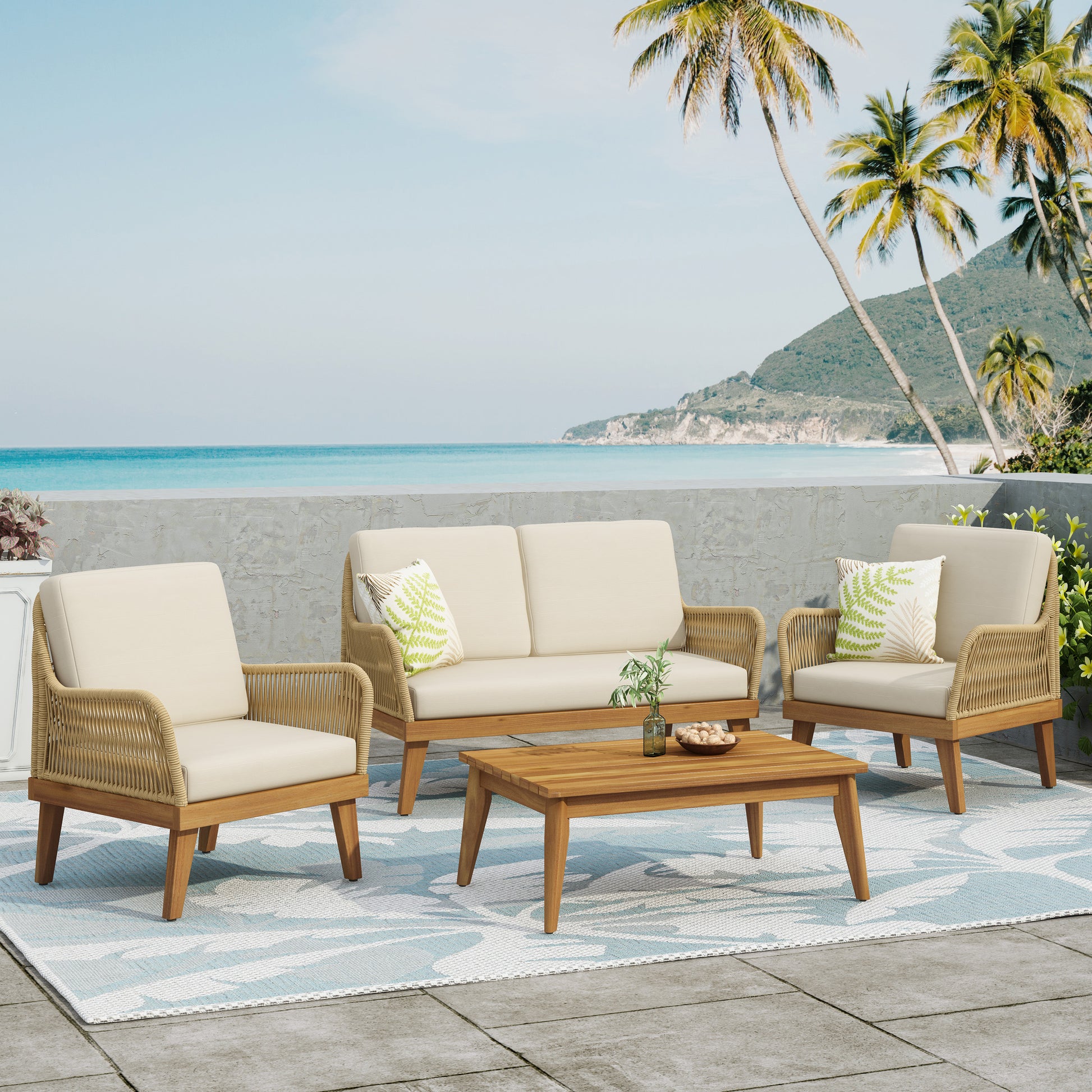 Woven rattan patio loveseat with beige cushions and wooden legs