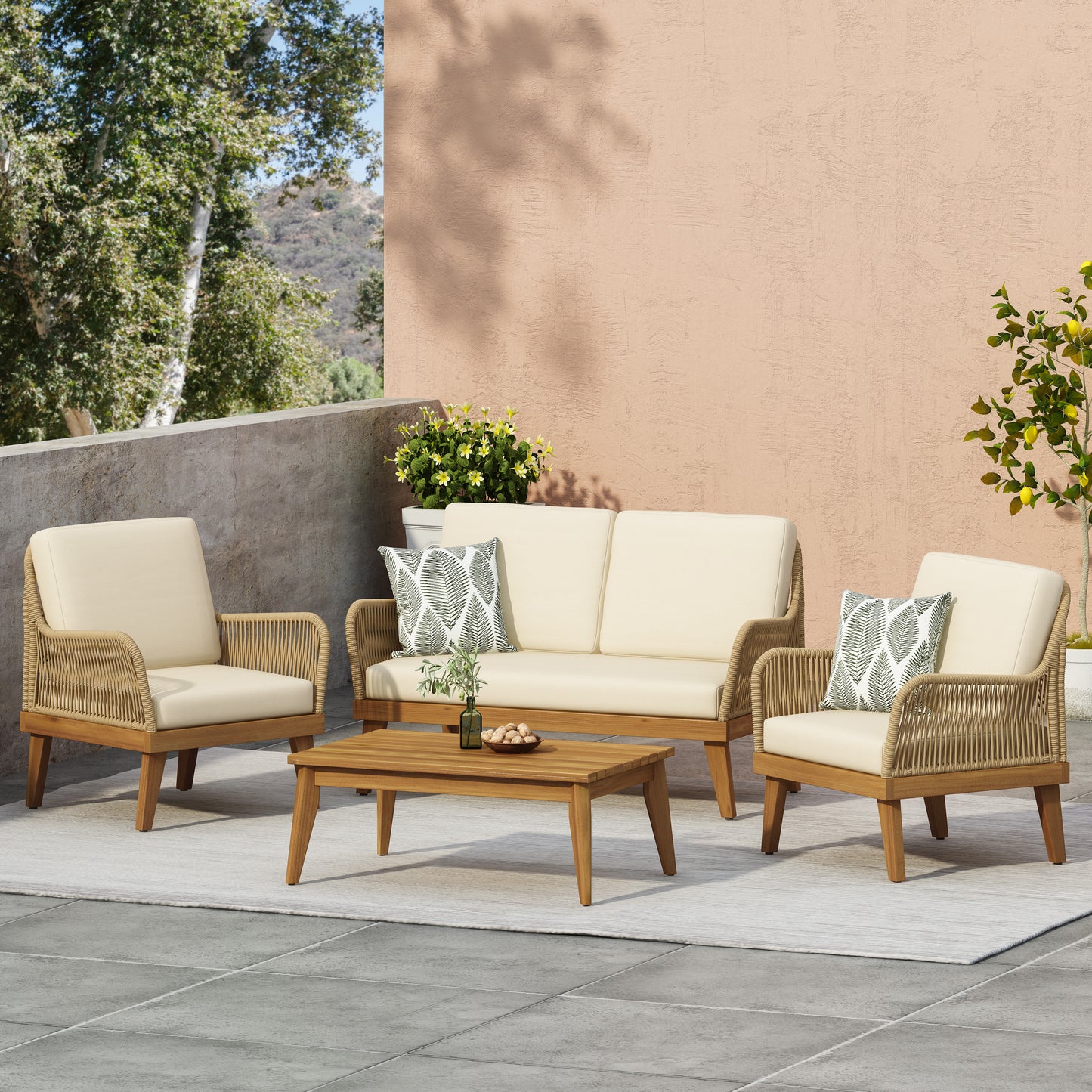 Cream upholstered outdoor sofa with wooden frame and woven detail