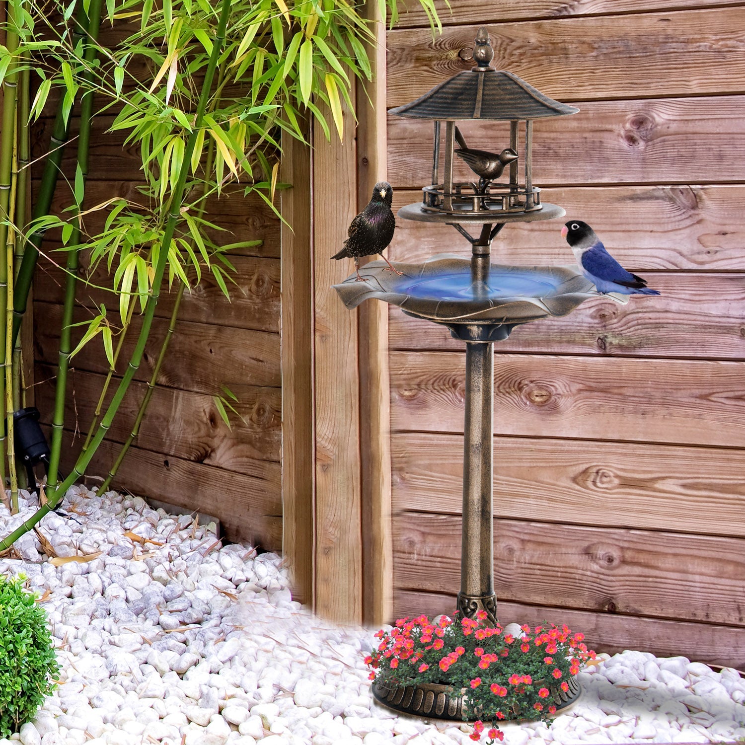 Ornate bronze bird bath and feeder with blue bird and starling guests  characters