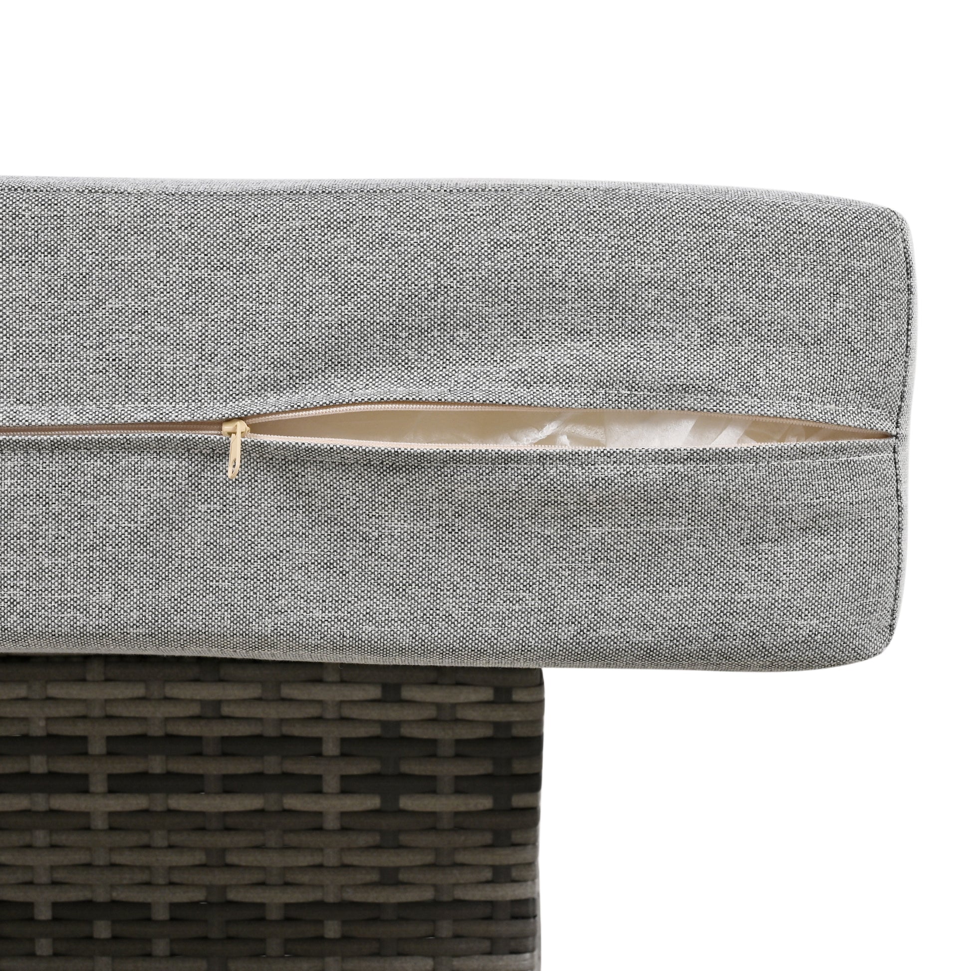 Grey wicker outdoor chair cushion with visible zipper detail