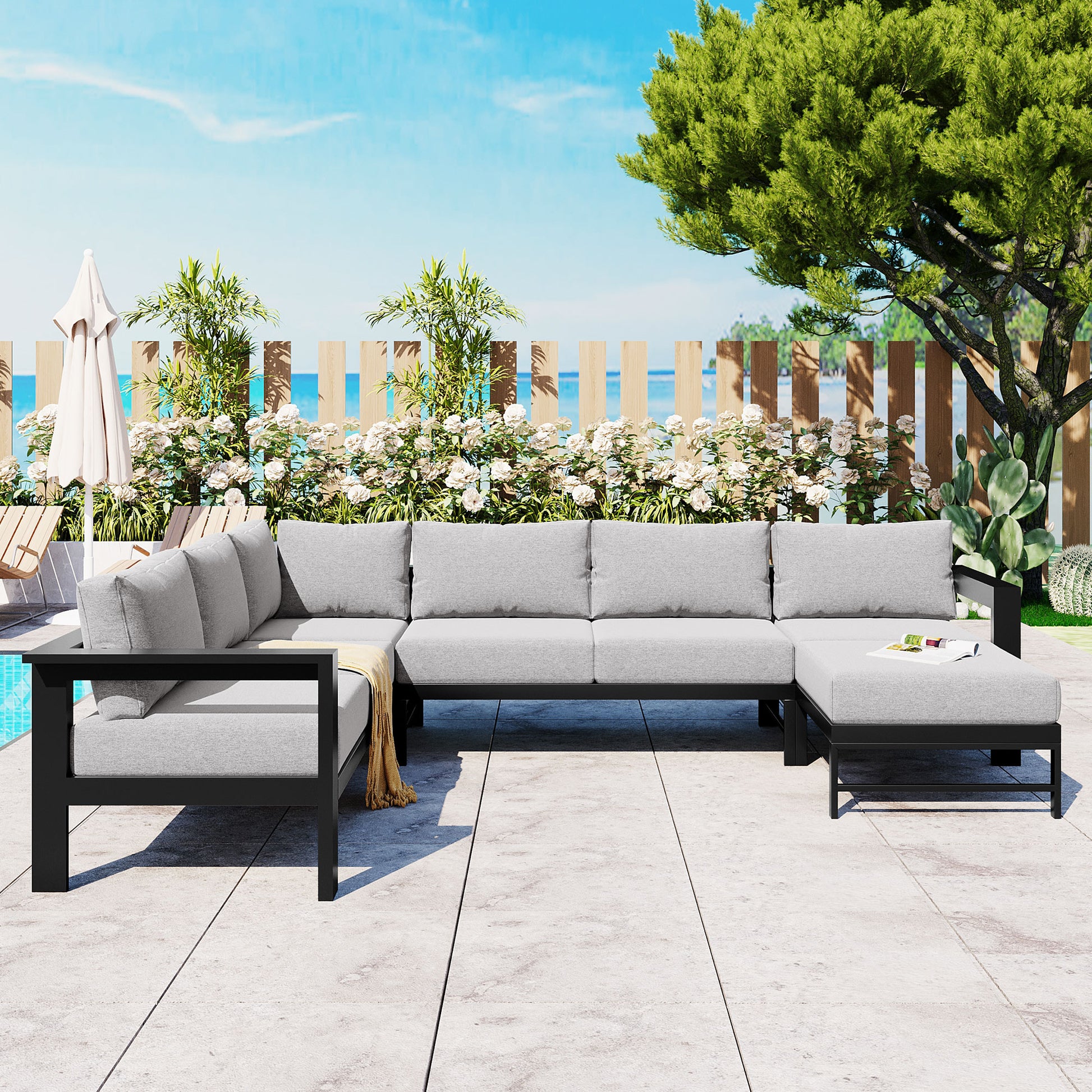 Gray modular outdoor sectional sofa with black metal frame perfect for patio gatherings