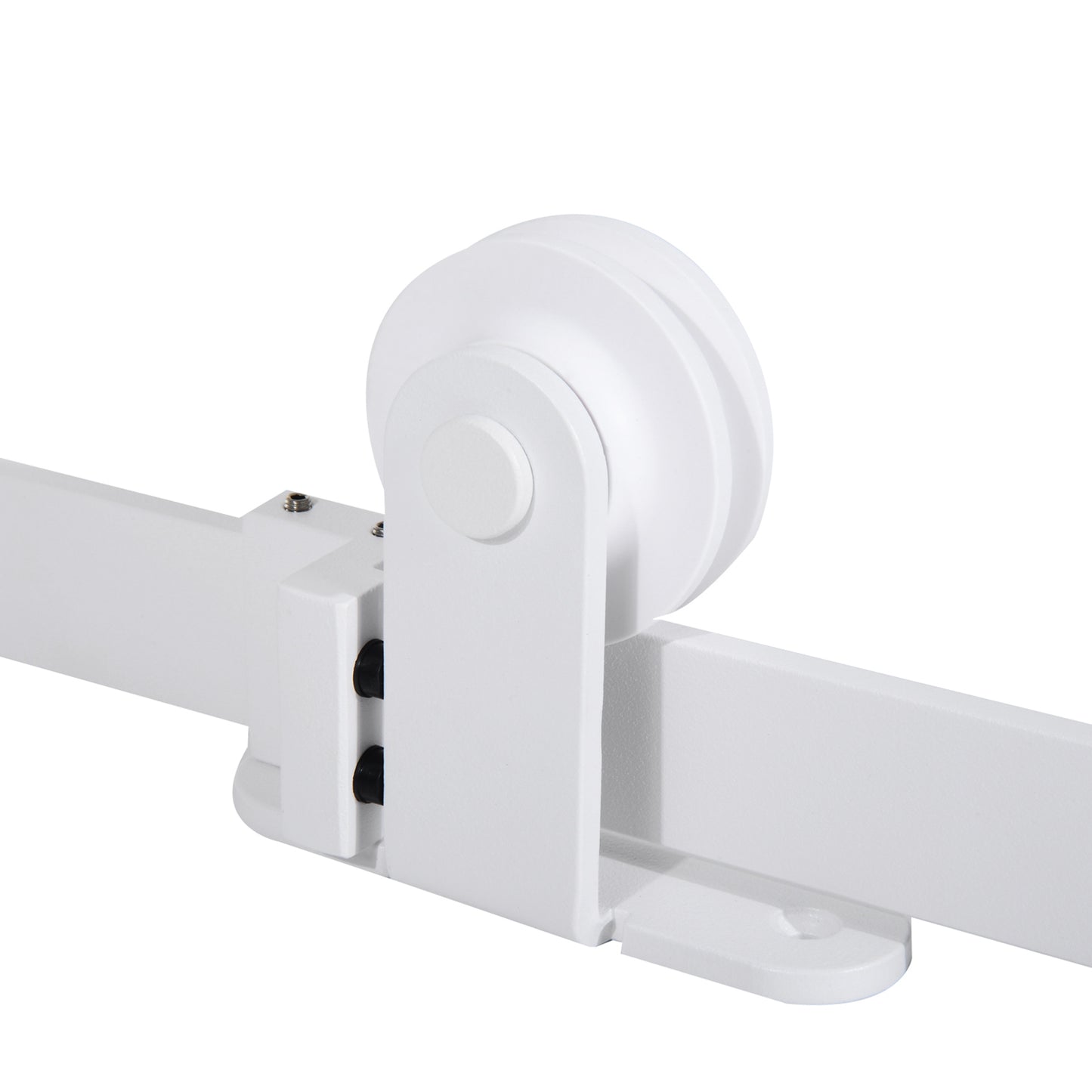 Close up of a white sliding barn door hardware roller and track assembly