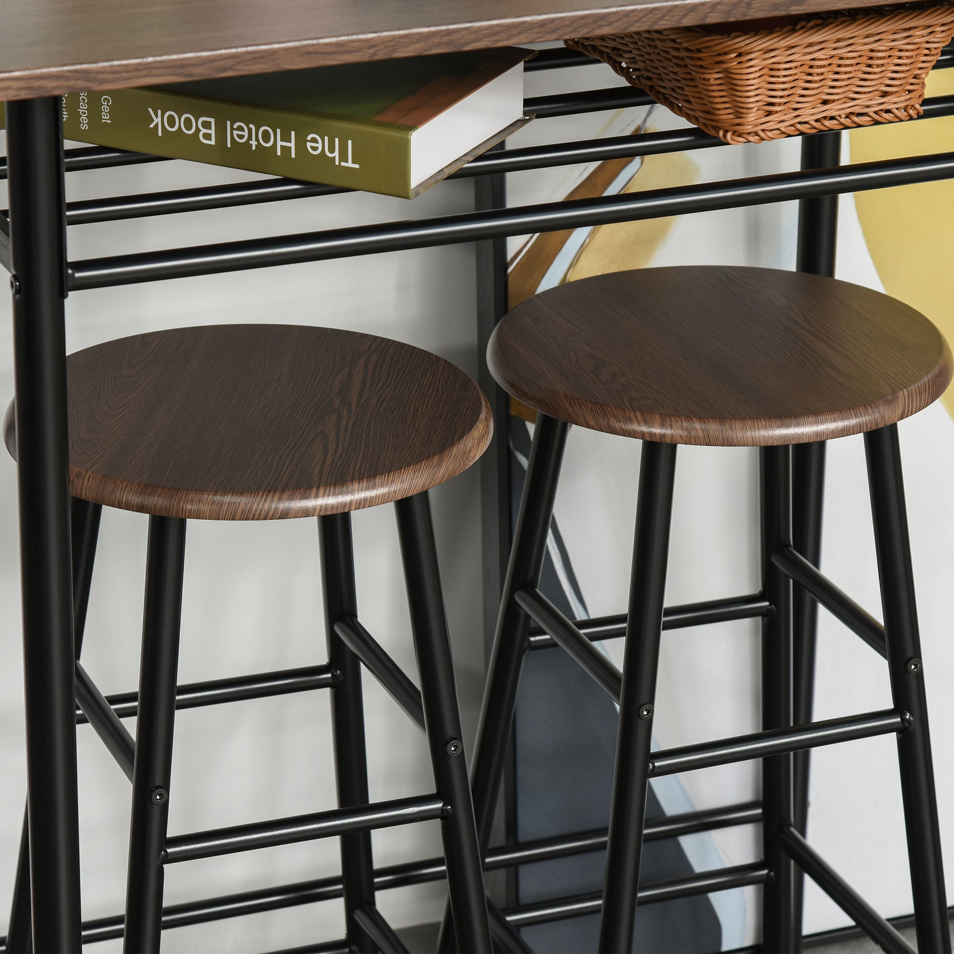 Two dark wood grain bar stools with black metal legs perfect for a modern kitchen counter