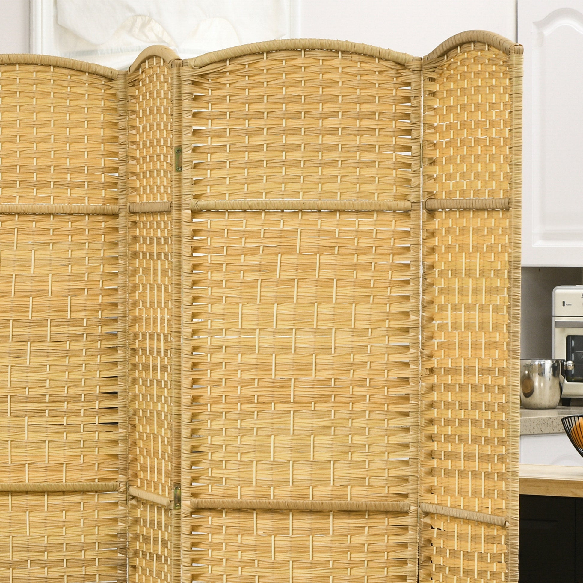 Natural woven bamboo room divider with intricate basketweave pattern adds organic texture to any space