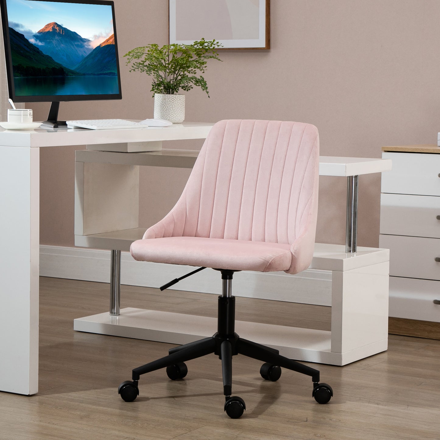 Pink velvet ergonomic office chair with vertical tufting and adjustable height
