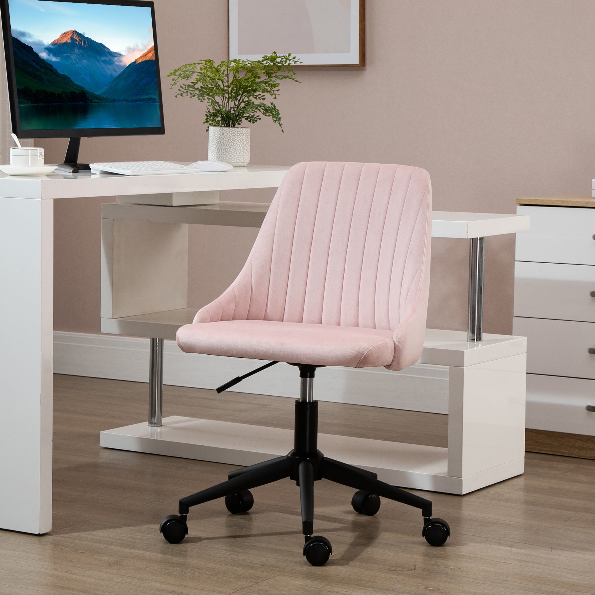 Pink velvet ergonomic office chair with vertical tufting and adjustable height
