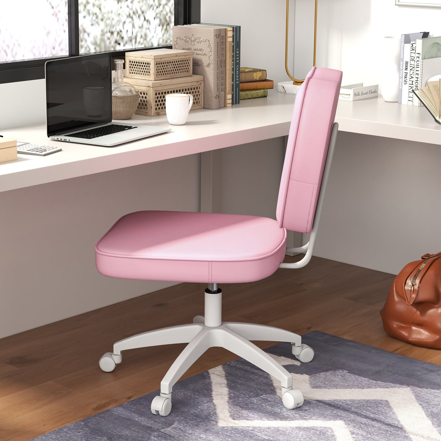 Pink upholstered rolling desk chair with white frame and five casters