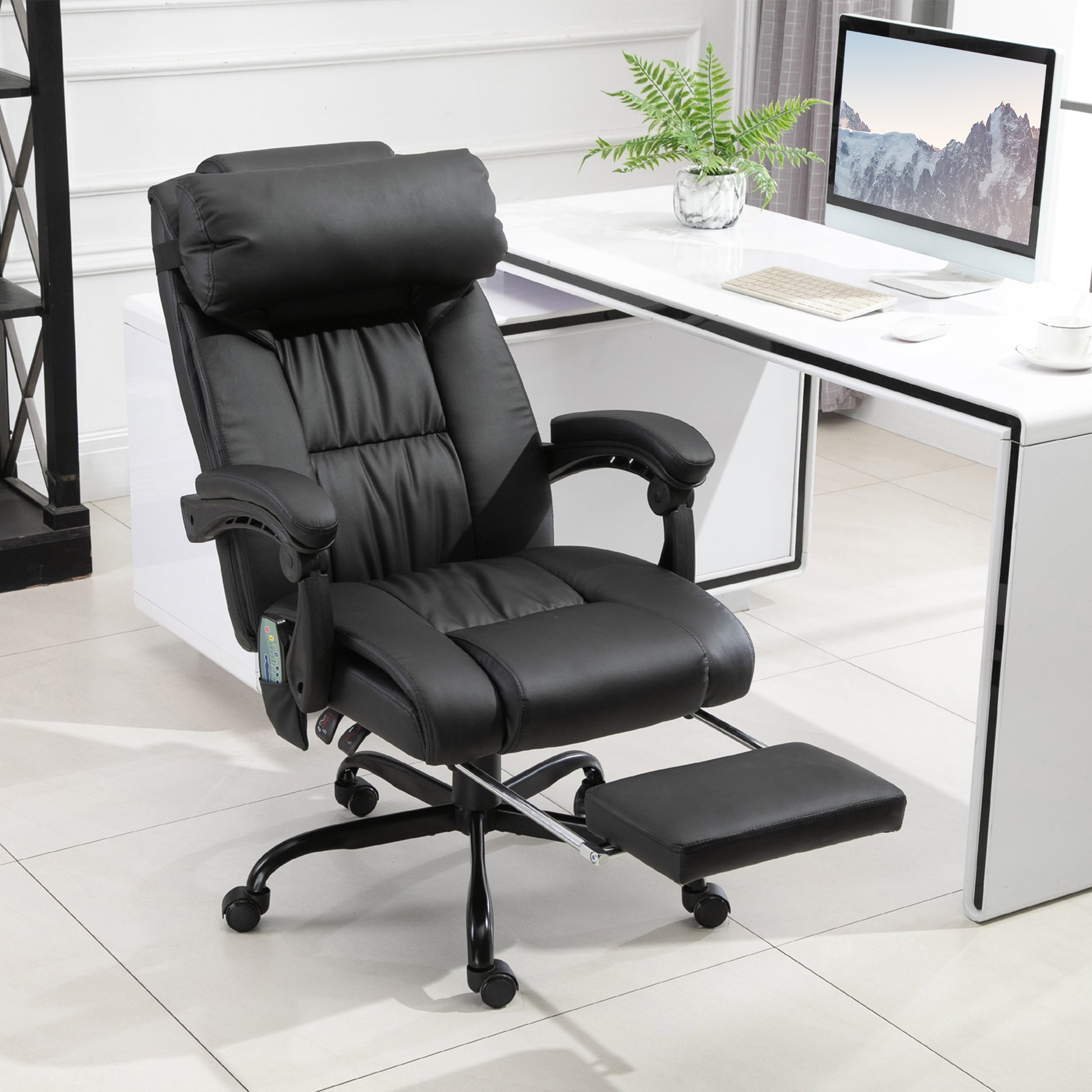 Black executive massage chair with adjustable footrest and headrest for home office comfort