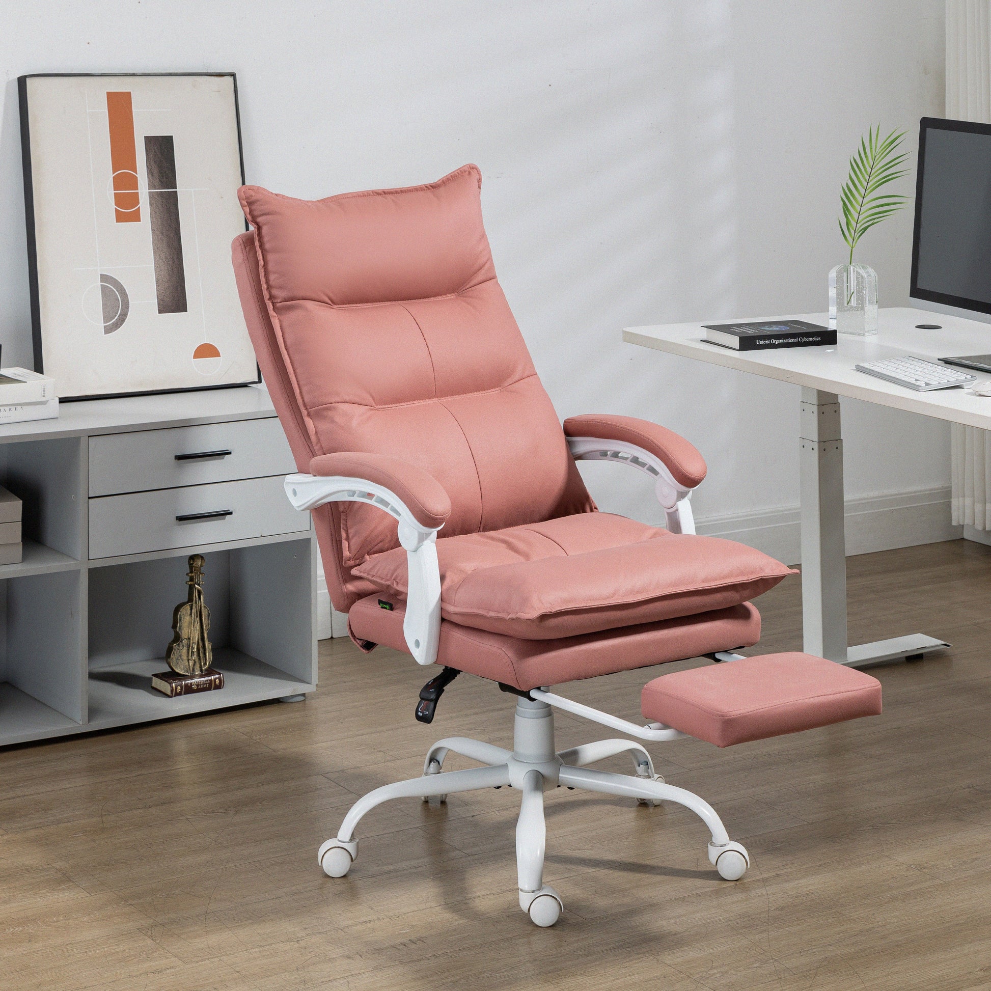 Pink ergonomic office chair with adjustable footrest and padded seat
