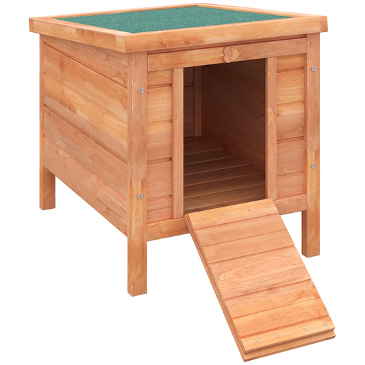 Wooden pet house with green textured roof and ramp for outdoor use