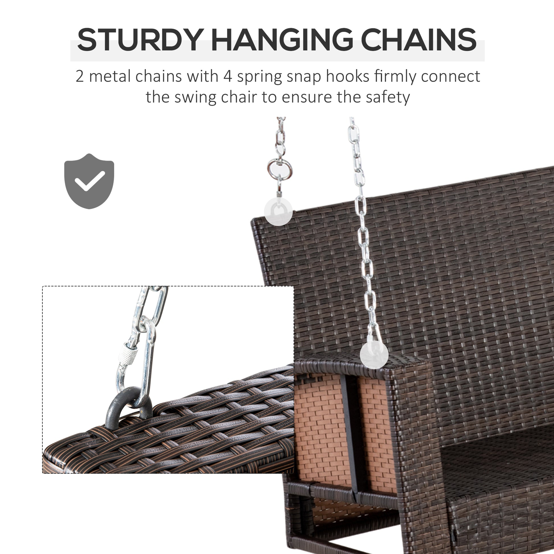 Sturdy metal hanging chains connect a brown rattan swing chair with white decorative spheres