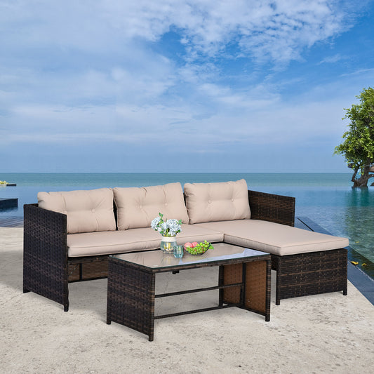 Brown wicker sectional outdoor sofa with beige cushions and glass coffee table