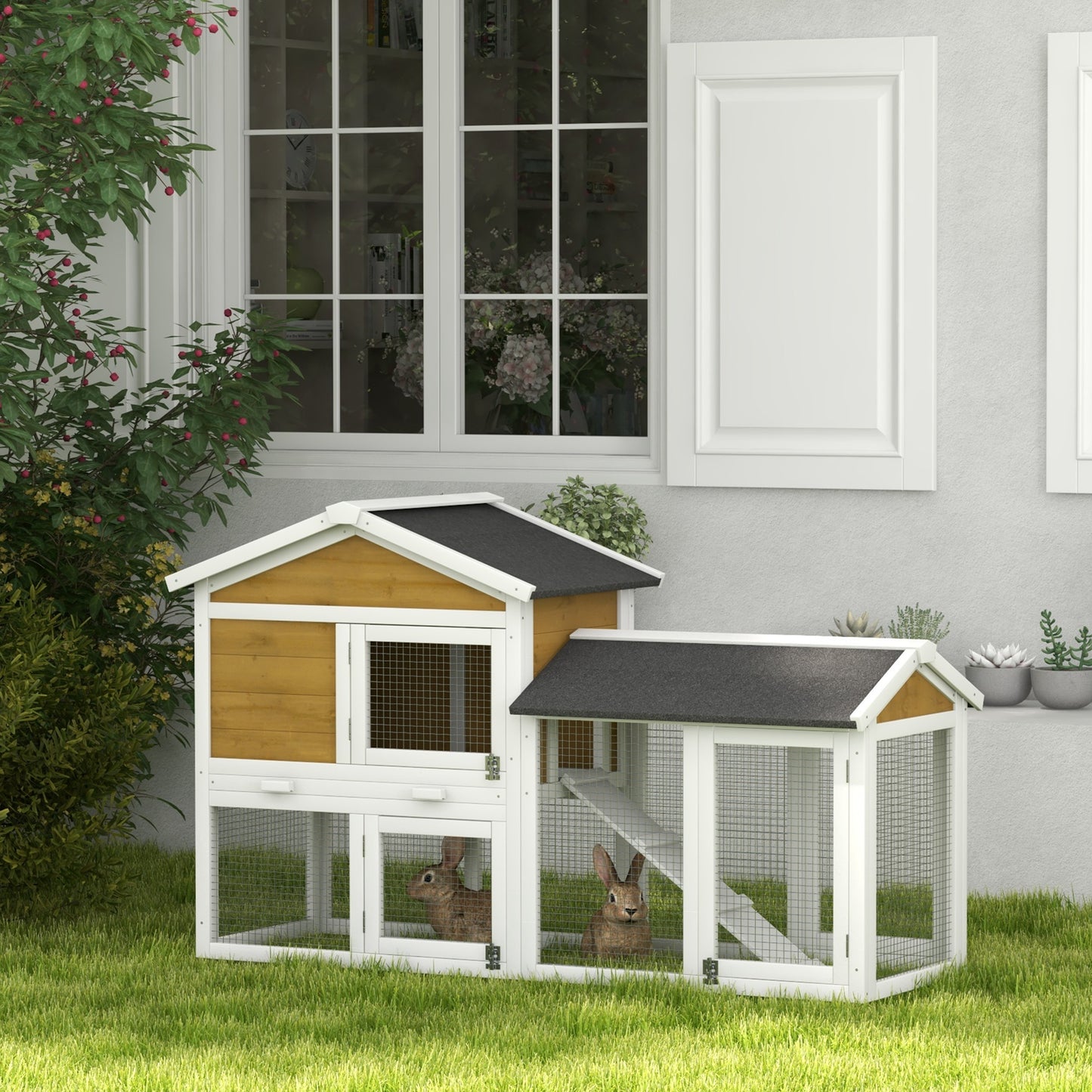 Twotier wooden bunny hutch with two rabbits inside offering secure outdoor housing