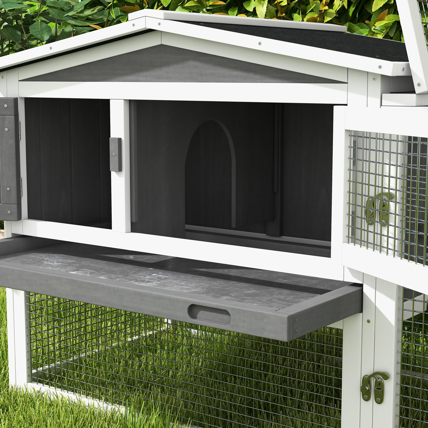 Spacious twostory rabbit hutch with durable grey and white construction featuring wire mesh and slideout tray