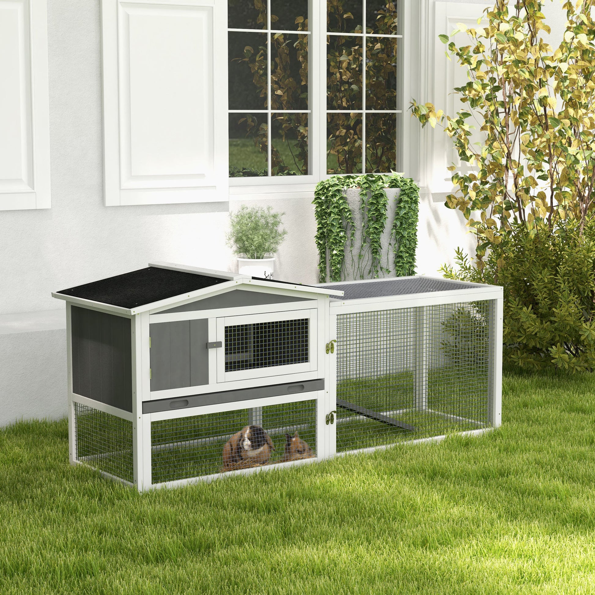 Twotier outdoor rabbit hutch with grey and white finish providing spacious enclosure for pets