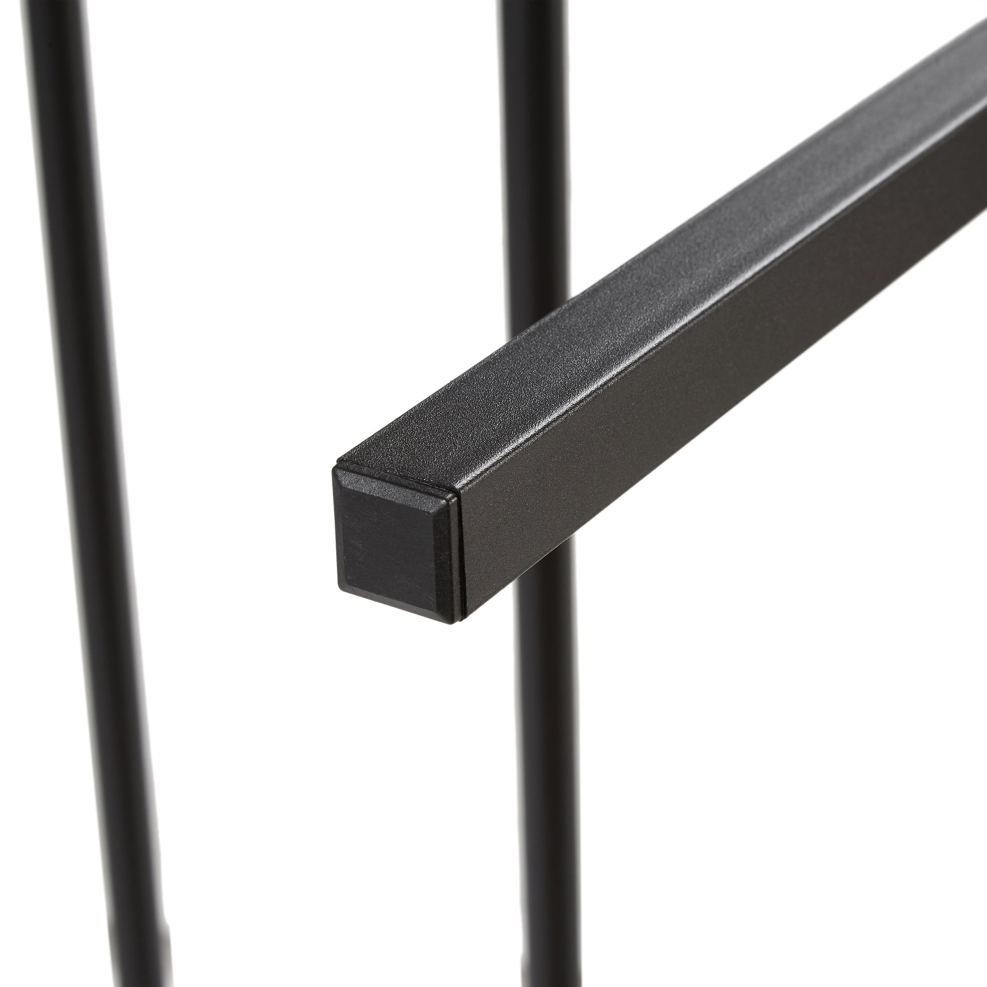 Closeup of matte black metal leg detail on furniture  characters